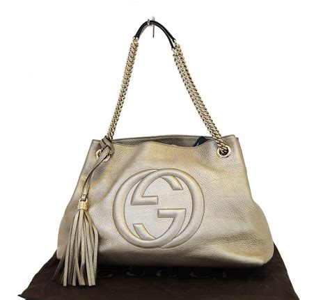 gucci gold chain belt bag|Gucci purse with gold chain.